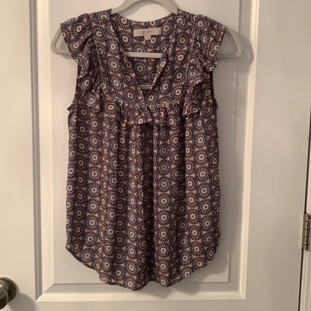 Blouse with decorative flower design